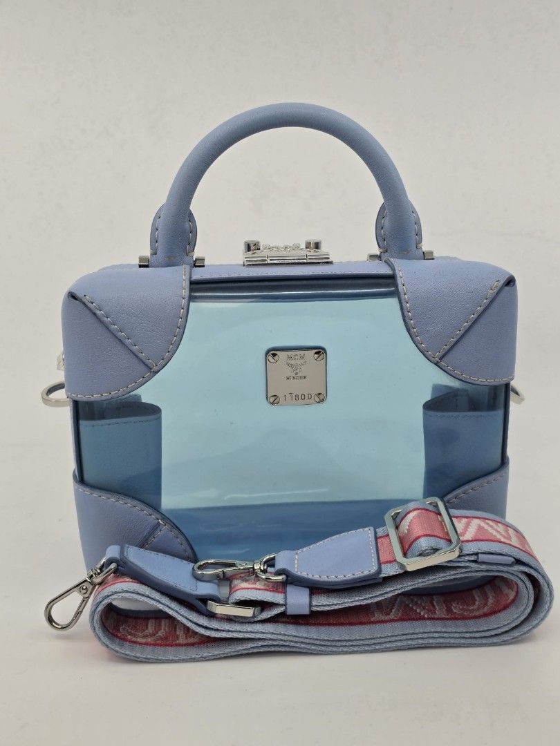 MCM (Category: Luxury Bags & Wallets) located in Quezon City. Submitted by nadine_miel (Listing ID 1451862580, Image 3). Description: Mcm Vanity Bag perfect alternative sa chanel vanity bag pvc material with guitar strap na swerte makaka mine nito ang 3 phone kasya maluwag pa Pwede ng summer and rainy season veryyyy cuteseey😍.