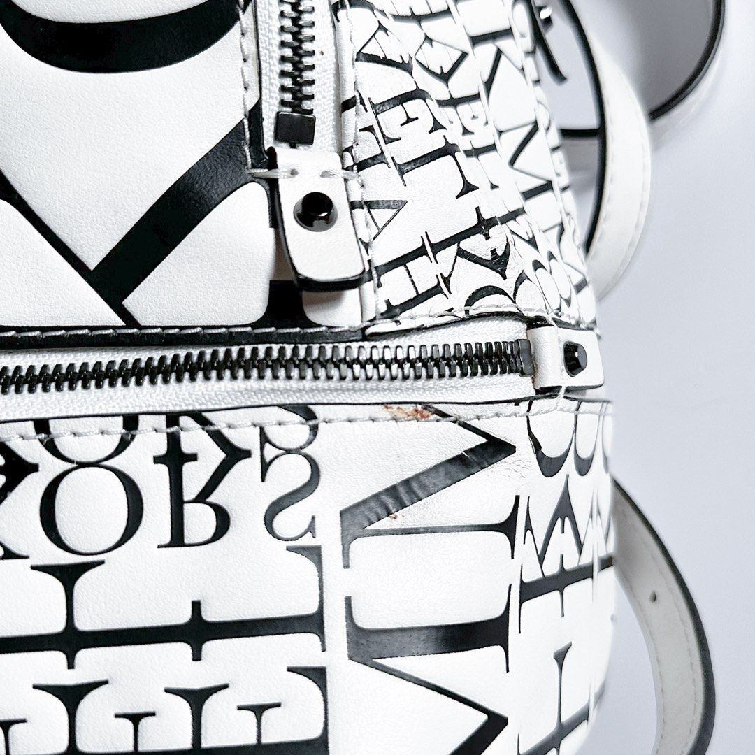 Michael Kors Backpack Newsprint Logo (Category: Luxury Bags & Wallets) located in Manila. Submitted by lene_ (Listing ID 1451772489, Image 3). Description: • Never been used • Original retail price: around ₱13,000 • Minor leather peeling due to long-term storage only • Just needs a light cleaning • Interior condition: 11/10 – looks brand new • No stains or marks inside • Comes with its original Michael Kors dust bag 📦 Shipping • Delivery fee wil