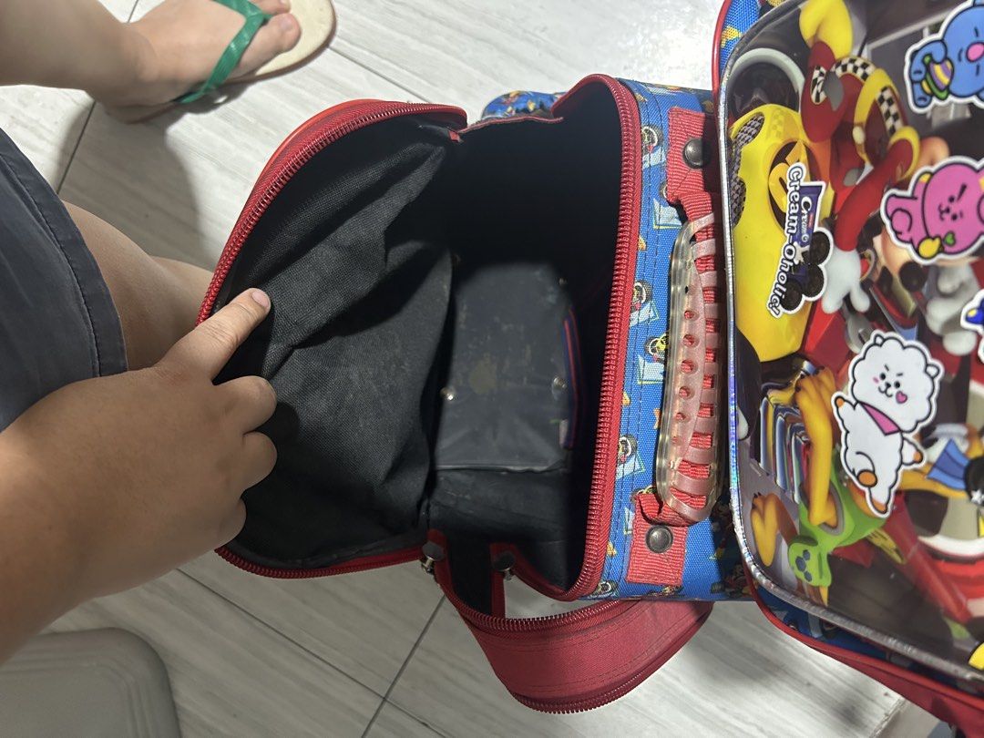 Mickey Mouse Kids' Rolling Bag & Lunch bag (Category: Diaper Bags & Wetbags) located in Paranaque City. Submitted by allthatclutterph (Listing ID 1451821252, Image 3). Description: - Adorable rolling bag for kids - Easy to transport with retractable handle and wheels - Multiple compartments for organized school supplies - Shows some signs of wear, but fully functional, all zippers working properly - Ideal for school or travel adventures - Needs w