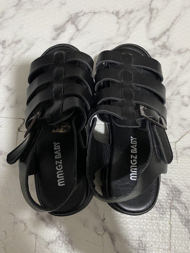 Mmgz Baby Black Chunky Platform Gladiator Sandals (Category: Babies & Kids Fashion) located in Valenzuela. Submitted by acandychin (Listing ID 1451870550, Image 2). Description: - Brand: Mmgz Baby - Style: Black Gladiator Sandals - Features: Chunky platform sole, buckle strap closure - Vibe: Cool and edgy - Versatility: Perfect for dressing up or down - Size: Eur 29 (17.5cm) .