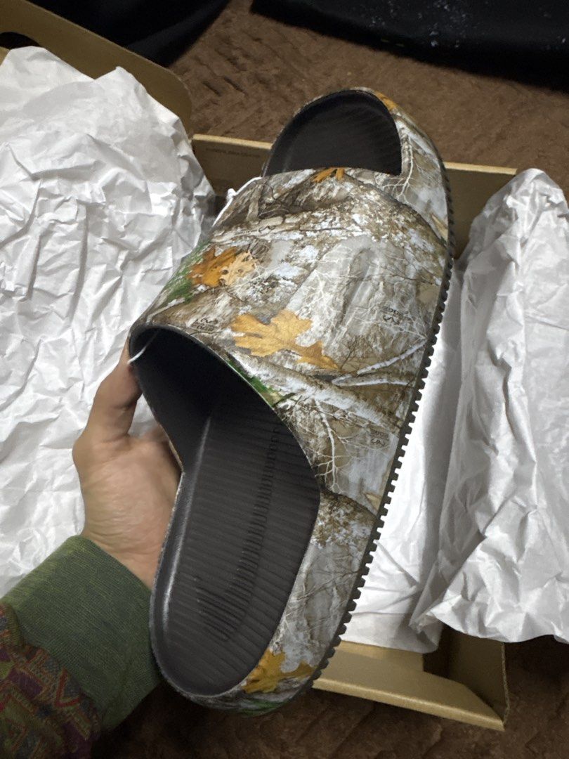 Nike Calm Slide Realtree Camo Slides Size 11/12 (Category: Flipflops and Slides) located in Kuala Lumpur. Submitted by izzul9 (Listing ID 1451740967, Image 2). Description: - Brand: Nike - Model: Calm Slide - Color/Print: Realtree Camo - Size: US Men's 11 / US Women's 12 - Condition: Brand new with original box - Ideal for: Casual wear and everyday comfort.