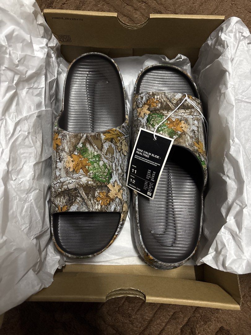 Nike Calm Slide Realtree Camo Slides Size 11/12 (Category: Flipflops and Slides) located in Kuala Lumpur. Submitted by izzul9 (Listing ID 1451740967, Image 1). Description: - Brand: Nike - Model: Calm Slide - Color/Print: Realtree Camo - Size: US Men's 11 / US Women's 12 - Condition: Brand new with original box - Ideal for: Casual wear and everyday comfort.