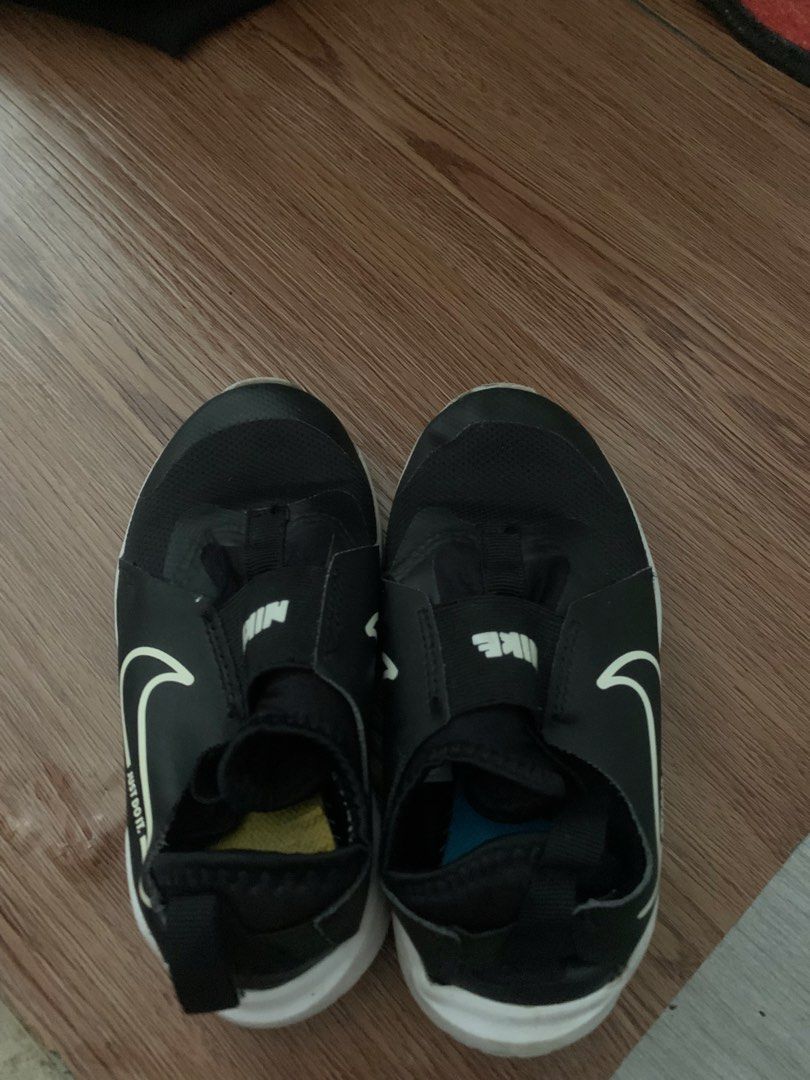 Nike Kids' Flex Runner 2 Road Running Shoes (Category: Babies & Kids Fashion) located in Cavite. Submitted by sjcat (Listing ID 1451702433, Image 3). Description: - Black Nike slip-on shoes for kids - Size: 11C - Easy to put on and take off - Features the classic Nike swoosh - Great for everyday wear.