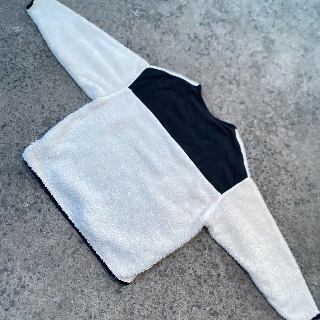 Nike Plush Fleece Zip-Up Jacket Cream Black (Category: Coats, Jackets and Outerwear) located in Manila. Submitted by gius_ich (Listing ID 1451733368, Image 2). Description: - Cream colored Nike fleece jacket - Black trim on collar and zipper - Embroidered Nike logo on chest - Black paneling on the back - Cozy and warm for cooler weather - Ideal for layering.