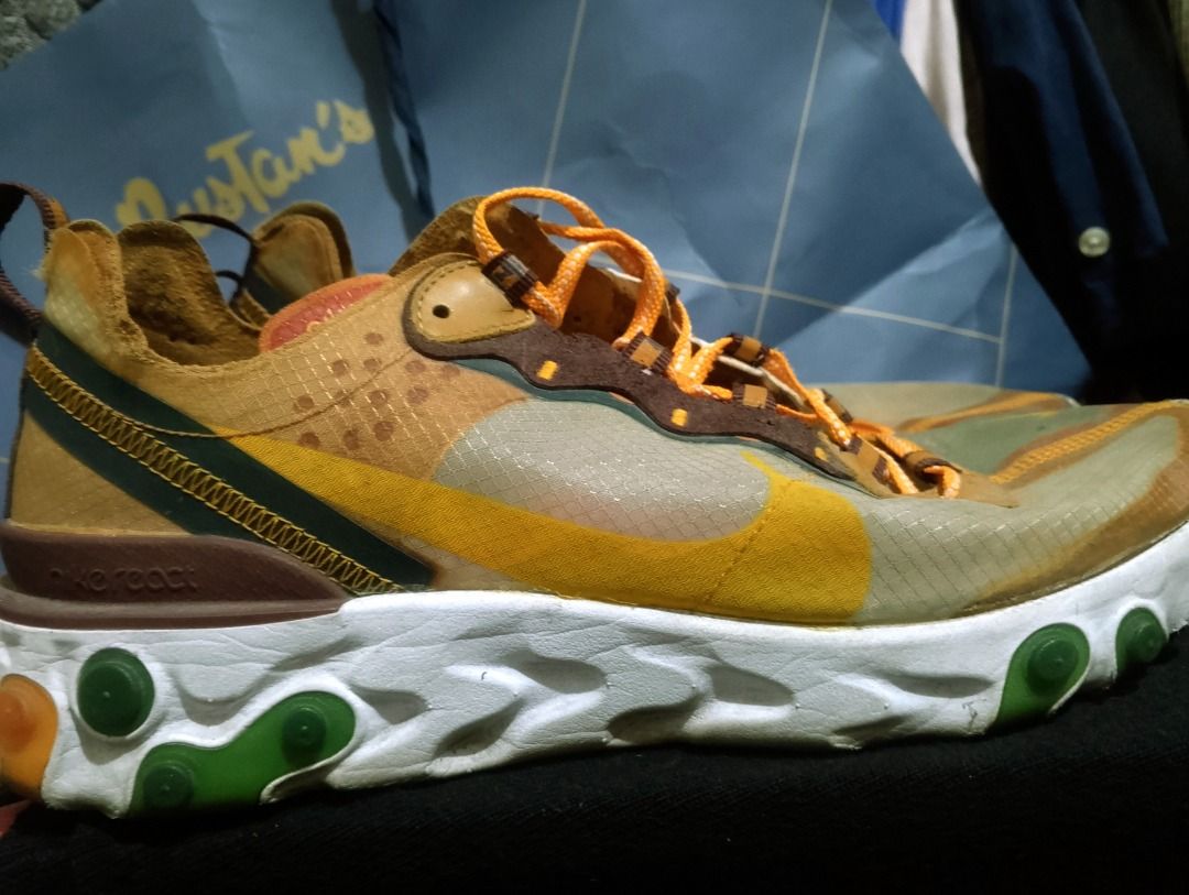 Nike React Element 87 "Moss" Sneakers (Category: Sneakers) located in Caloocan City. Submitted by edsrnava83134 (Listing ID 1451820747, Image 1). Description: - Nike React Element 87 in 'Moss' colorway. - Features a translucent upper. - Accents of brown, yellow, and green. - Unique lacing system. - Comfortable React foam sole. - Perfect for everyday wear and athletic activities. - Distinctive and stylish kicks..