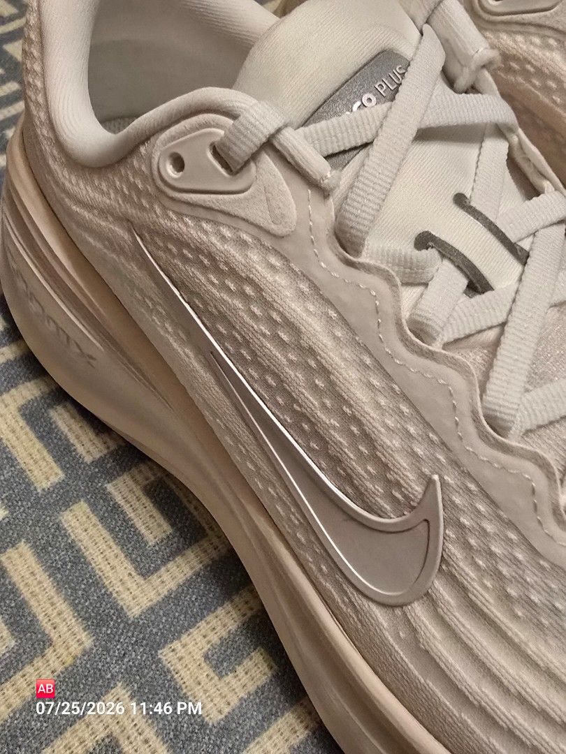 Nike Vomero Plus Summit White (Category: Sneakers) located in Quezon City. Submitted by 3mlab (Listing ID 1451879154, Image 3). Description: Nike Vomero Plus Summit White / Phantom Chalk style code: IO991-100 • thick contoured ZoomX foam midsole finished in a soft cream/tint. • breathable, super lightweight engineered upper in Summit White. • subtle tonal detailing along the heel pull tab and embroidered Swoosh outline. • size 10 and size 8 Brand