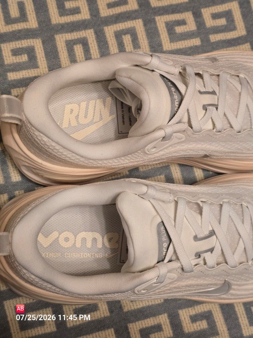 Nike Vomero Plus Summit White (Category: Sneakers) located in Quezon City. Submitted by 3mlab (Listing ID 1451879154, Image 2). Description: Nike Vomero Plus Summit White / Phantom Chalk style code: IO991-100 • thick contoured ZoomX foam midsole finished in a soft cream/tint. • breathable, super lightweight engineered upper in Summit White. • subtle tonal detailing along the heel pull tab and embroidered Swoosh outline. • size 10 and size 8 Brand
