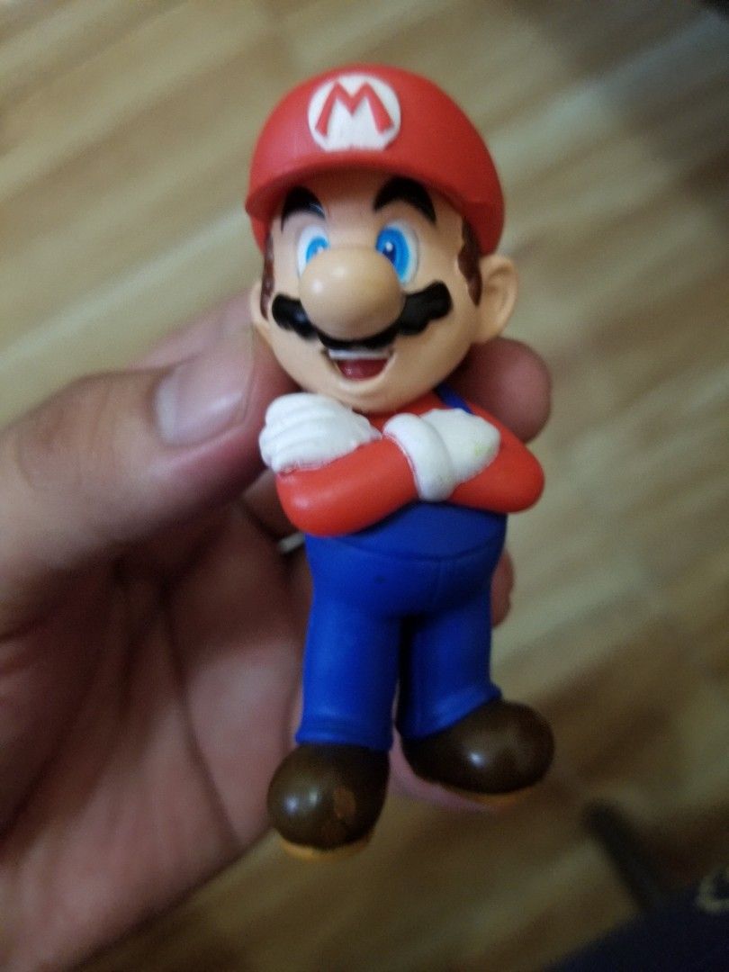Nintendo Super Mario Bros. Action Figure Toy (Category: Figurines & Statues) located in Paranaque City. Submitted by m4rkjulius07672 (Listing ID 1451782640, Image 1). Description: - Classic Mario figure with iconic blue overalls and red 'M' hat. - Perfect for both collectors and playtime. - Small, easy-to-hold size. - Made of durable plastic for exclusive only for Nintendo club members long-lasting fun. - A must-have for any Mario fan!.