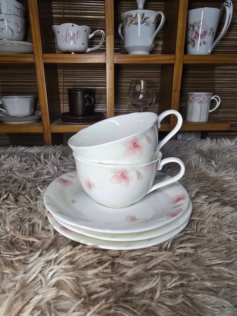 Noritake Bone China Tea Cups and Saucers Set (Category: Coffee & Tea Tableware) located in Zamboanga. Submitted by lunavinum (Listing ID 1451896521, Image 2). Description: Noritake Sakura Bone China Approx meas: cup 4x3, saucer 6 Condition: Brand New With plastic pa 350 each 650 take all + free 1 saucer .
