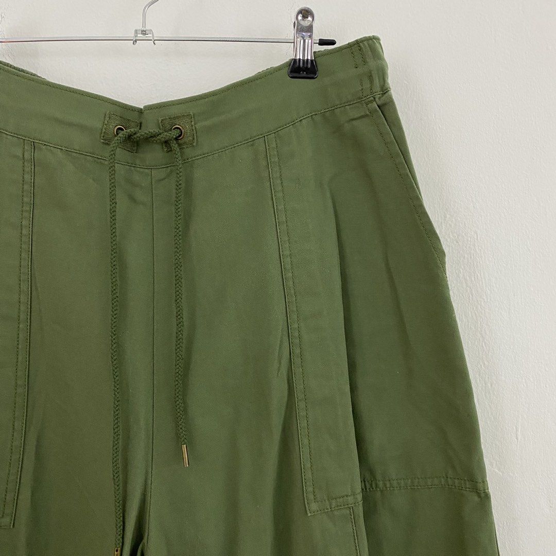 Niko and… Wide Leg Drawstring Pants (Category: Other Bottoms) located in Cavite. Submitted by mana__ (Listing ID 1451830601, Image 2). Description: - Olive green wide-leg pants - Adjustable drawstring waist for a comfortable fit - Two front pockets with subtle stitching detail - Made from a sturdy cotton blend fabric - Versatile for casual wear and easy to style - Size 4 Waist - 28-33 Length - 38.5 Inseam - 24.5 Thigh - 14 Knee - 14 Leg op - 10.5