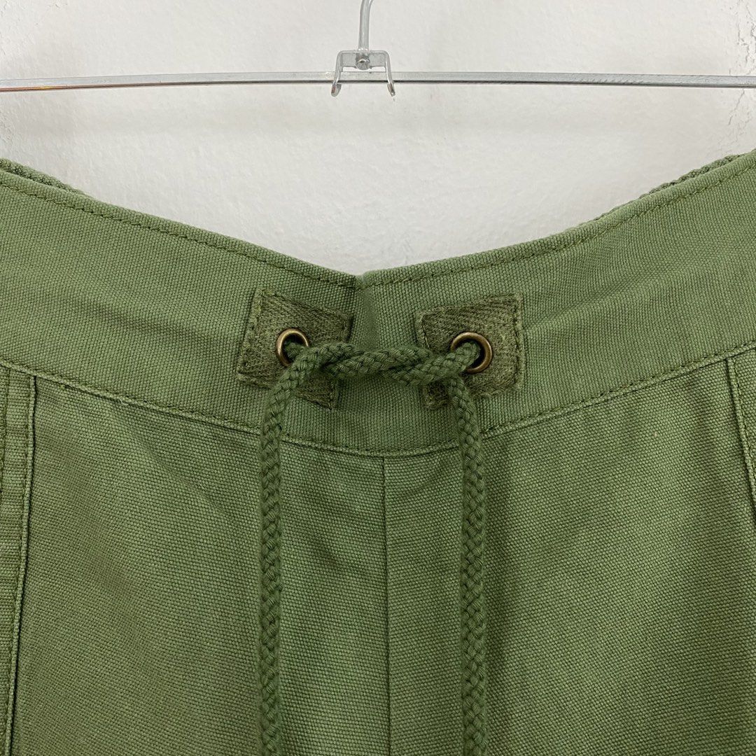 Niko and… Wide Leg Drawstring Pants (Category: Other Bottoms) located in Cavite. Submitted by mana__ (Listing ID 1451830601, Image 3). Description: - Olive green wide-leg pants - Adjustable drawstring waist for a comfortable fit - Two front pockets with subtle stitching detail - Made from a sturdy cotton blend fabric - Versatile for casual wear and easy to style - Size 4 Waist - 28-33 Length - 38.5 Inseam - 24.5 Thigh - 14 Knee - 14 Leg op - 10.5