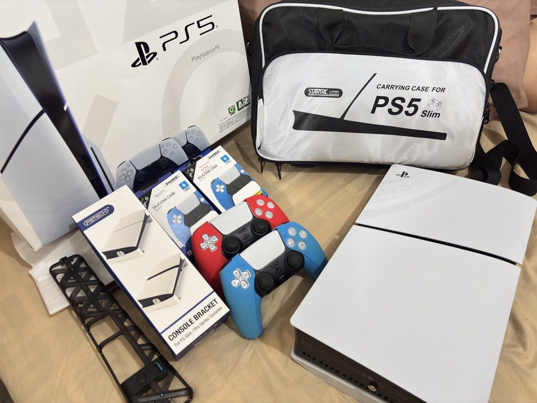 PlayStation 5 Slim Console + Accessories + Carrying Case (Category: PlayStation) located in Caloocan City. Submitted by zealfox.707eb3 (Listing ID 1451726438, Image 1). Description: - PlayStation 5 Slim Console - Original Box Included - Protective Carrying Case - Console Bracket - Silicone Controller Covers - Skull & Co. Thumb Grip - Complete bundle for immediate gaming!.