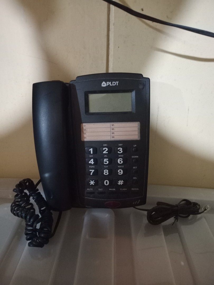 PLDT Corded Telephone with LCD Display (Category: Office & Business Technology) located in Baguio. Submitted by loweasel (Listing ID 1451716500, Image 1). Description: - PLDT corded telephone - LCD screen for caller ID and information - Standard keypad with mute, pause, and redial buttons - Includes handset and coiled cord - Main phone unit included - Ready for immediate use.