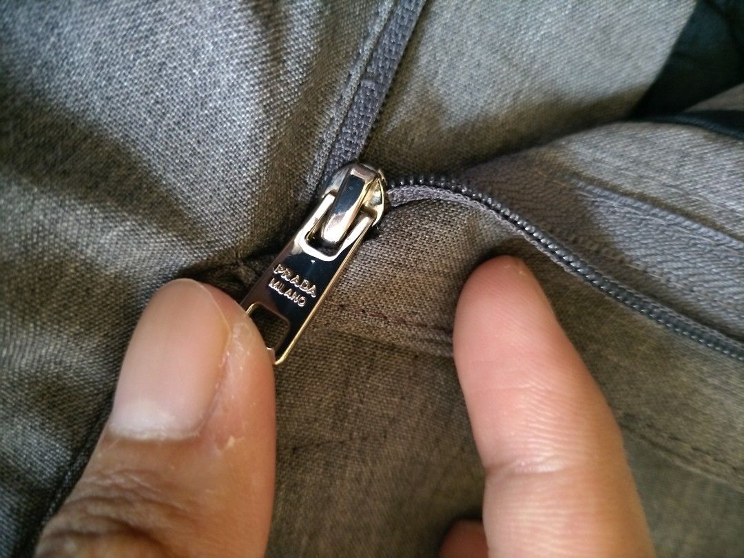 Prada Milano 22ss Triangle Patch Slacks (Category: Trousers) located in San Mateo. Submitted by 3hourz (Listing ID 1451740079, Image 3). Description: Width: 29-30 in Length: 40 in.