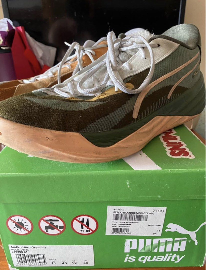 Puma All-Pro Nitro Gremlins Basketball Shoes (Category: Sneakers) located in Cavite. Submitted by mattheo2 (Listing ID 1451778513, Image 1). Description: - Puma All-Pro Nitro Gremlins Basketball Shoes - Size: 11 - Unique design with green and orange accents - Comes with original box - Ideal for collectors and basketball players.