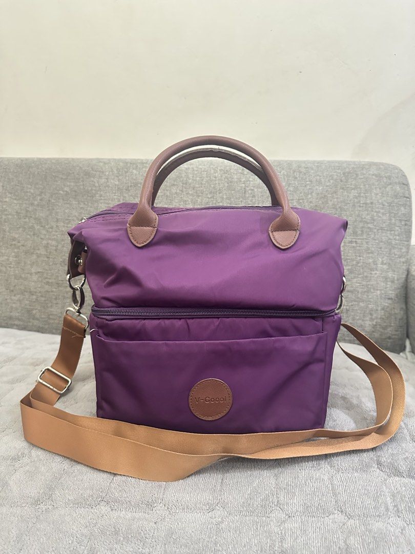 Purple V-Coool Insulated Cooler Bag Two Layer with Shoulder Strap (Category: Other Babies Going Out Needs) located in Antipolo. Submitted by msanjuan (Listing ID 1451840395, Image 1). Description: - Stylish purple V-Coool cooler bag - Insulated interior to keep expressed milk or food warm or cold - Zippered main compartment for secure storage - Convenient front pocket for extra items - Features both top handles and a detachable shoulder strap - I