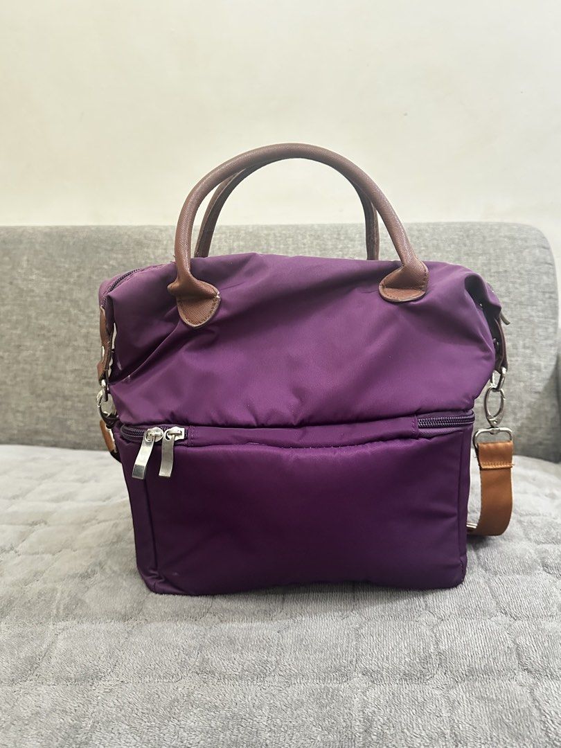 Purple V-Coool Insulated Cooler Bag Two Layer with Shoulder Strap (Category: Other Babies Going Out Needs) located in Antipolo. Submitted by msanjuan (Listing ID 1451840395, Image 3). Description: - Stylish purple V-Coool cooler bag - Insulated interior to keep expressed milk or food warm or cold - Zippered main compartment for secure storage - Convenient front pocket for extra items - Features both top handles and a detachable shoulder strap - I