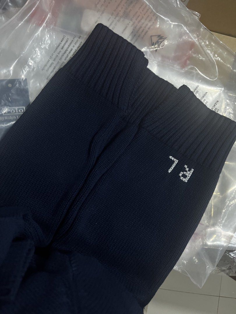 Ralph lauren Navy Polo Bear Sweater (Category: Coats, Jackets and Outerwear) located in Quezon City. Submitted by classychicph92 (Listing ID 1451723436, Image 3). Description: - Classic navy sweater - Iconic Polo bear graphic - Long sleeves - Crew neck - Comfortable knit material - Perfect for a casual yet stylish look.