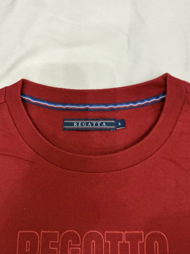 Regatta Wanderlust T-Shirt - Red - Size L (Category: Tshirts & Polo Shirts ) located in Bocaue. Submitted by mhonluigo (Listing ID 1451844804, Image 3). Description: - Red Regatta T-shirt - Features 'Wanderlust' graphic - Repeating 'Regatta' text in background - Comfortable crew neck - Size: Large (L) - Ideal for casual wear.