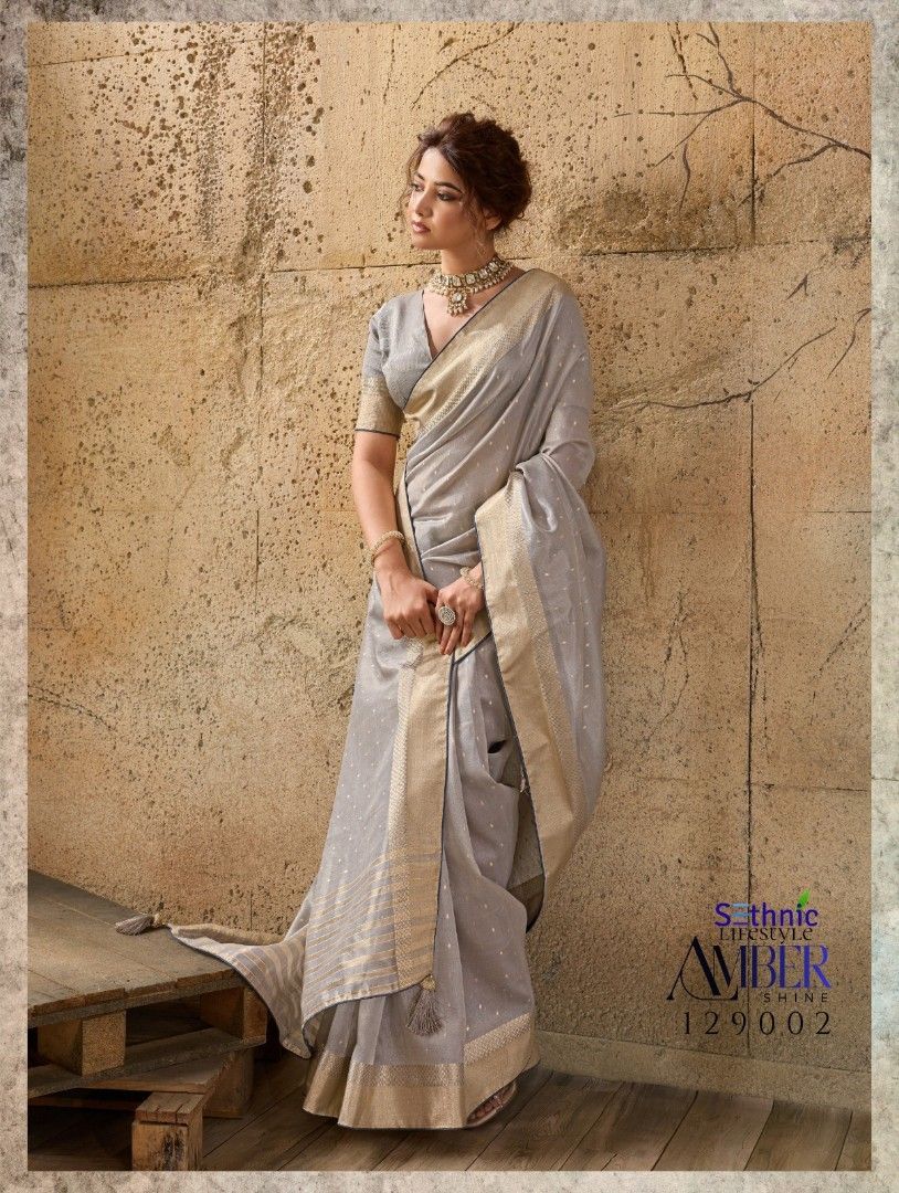 Saree (Category: Traditional & Ethnic wear) located in Singapore. Submitted by jr.fashion. (Listing ID 1451834026, Image 3). Description: *Subtle shimmer meets airy comfort! Introducing AMBER SHINE—a dreamy collection of lightweight Tissue Linen Sarees designed for effortless festive elegance.* *Brand : Sethnic Lifestyle* *Catalog Name : Amber Shine* *Series: 129001 TO 129005* *Saree : Ultra-breathable, lightweight Tissue Linen with a subtle meta