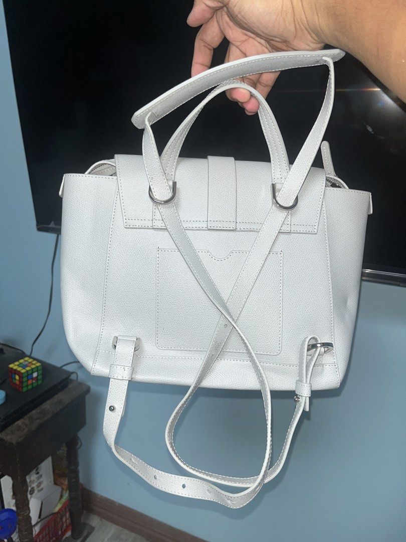 Senreve Maestra four-way Bag (Category: Luxury Bags & Wallets) located in Calapan. Submitted by axlefinestpicks (Listing ID 1451865563, Image 2). Description: Senreve Maestra Standard size Pebbled leather Colorway: Ice Four-way (Shoulder, backpack, tote or satchel) Leather is in pristine condition Little stain on the side but will be easy to clean. Insides are immaculate. No cracks or deep scratches..