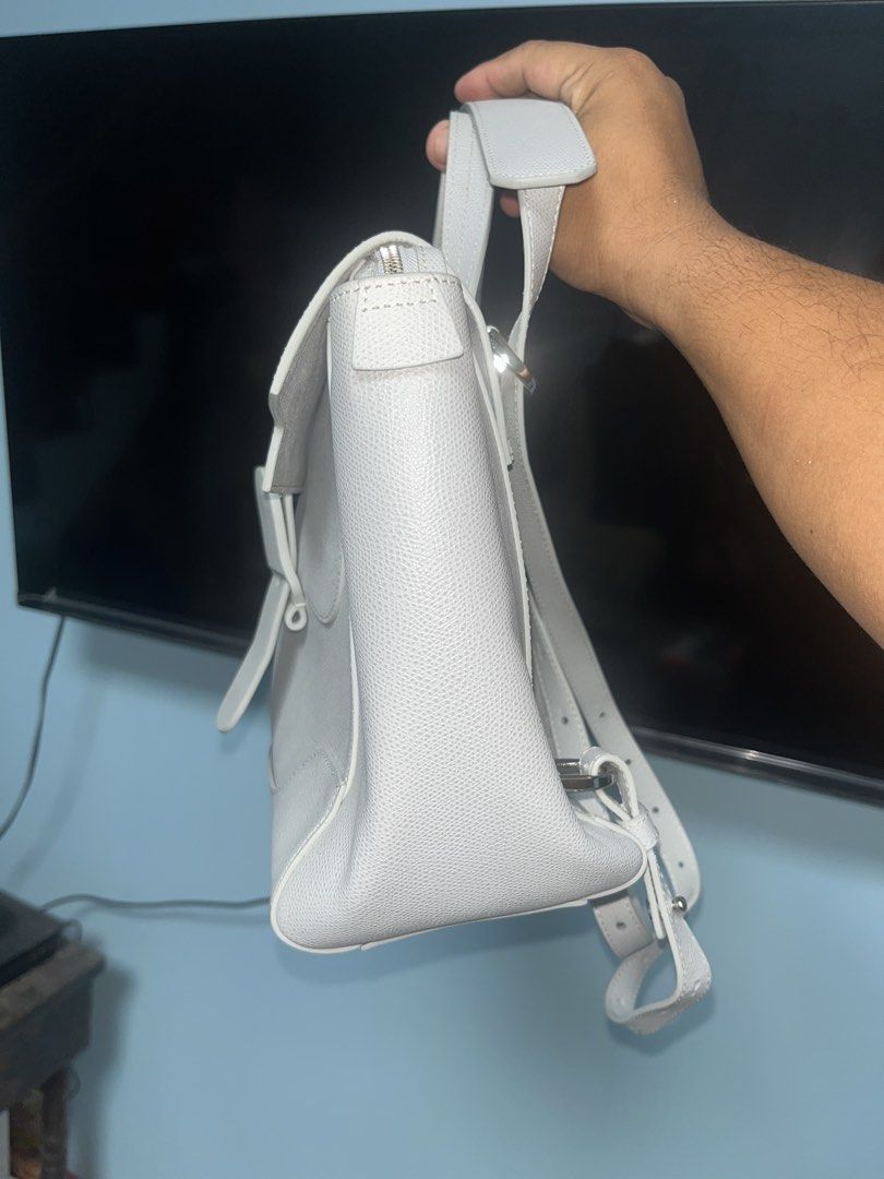 Senreve Maestra four-way Bag (Category: Luxury Bags & Wallets) located in Calapan. Submitted by axlefinestpicks (Listing ID 1451865563, Image 3). Description: Senreve Maestra Standard size Pebbled leather Colorway: Ice Four-way (Shoulder, backpack, tote or satchel) Leather is in pristine condition Little stain on the side but will be easy to clean. Insides are immaculate. No cracks or deep scratches..