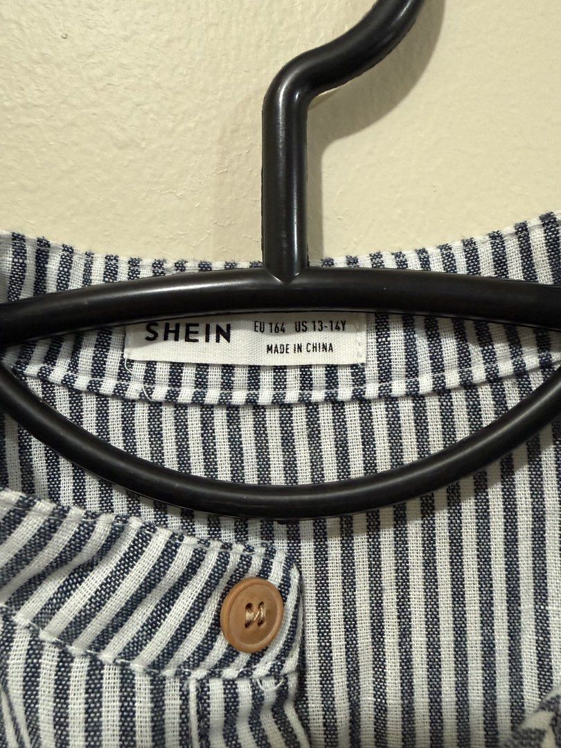SHEIN Chinese Colar Polo (Category: Babies & Kids Fashion) located in Taguig. Submitted by _decluttermomma_ (Listing ID 1451882366, Image 2). Description: Preloved SHEIN Used once 💵 180.
