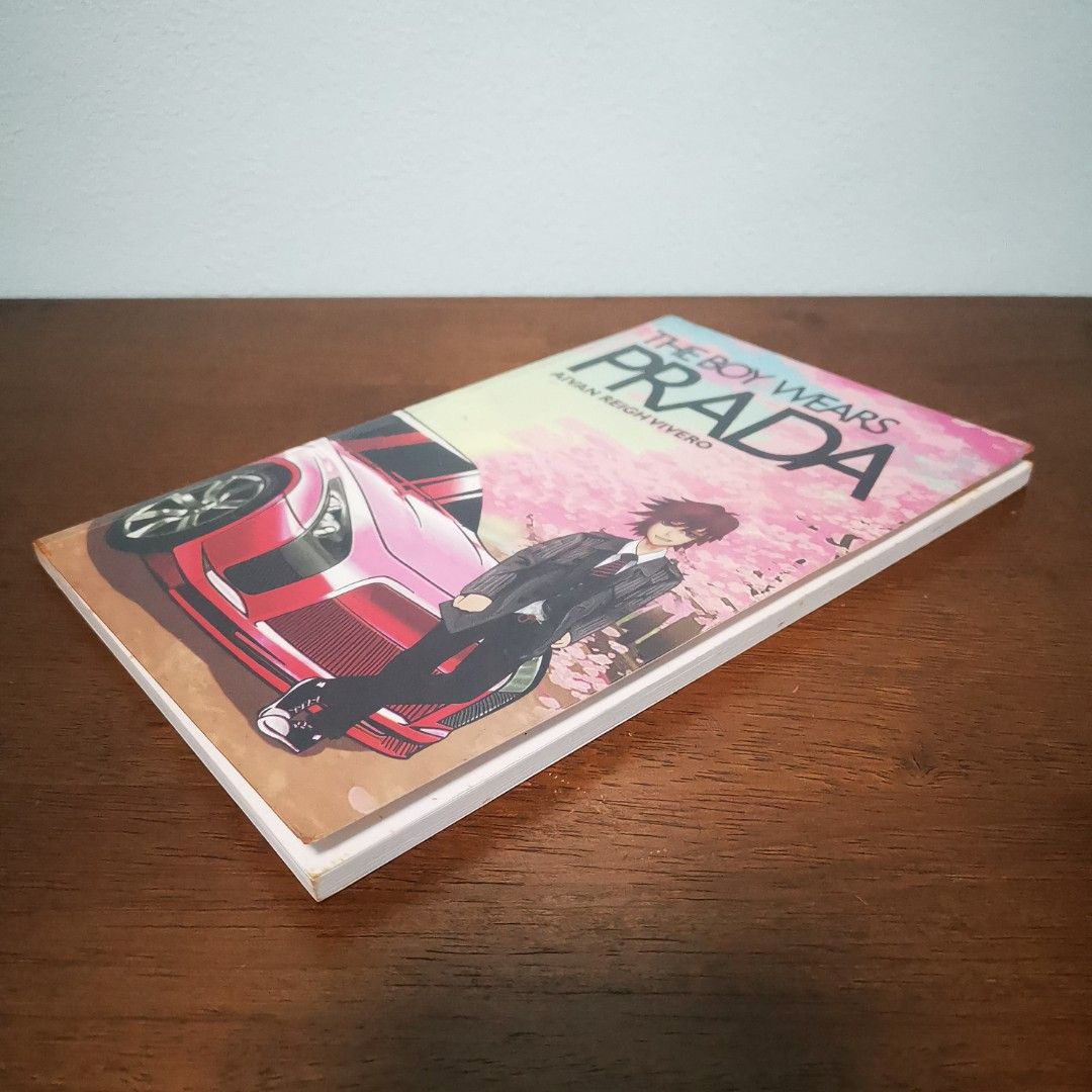 SIGNED The Boy Wears Prada by Aivan Reigh Vivero (Category: Storybooks) located in Mandaluyong City. Submitted by cesliah23 (Listing ID 1451895941, Image 3). Description: Signed with name With plastic cover.