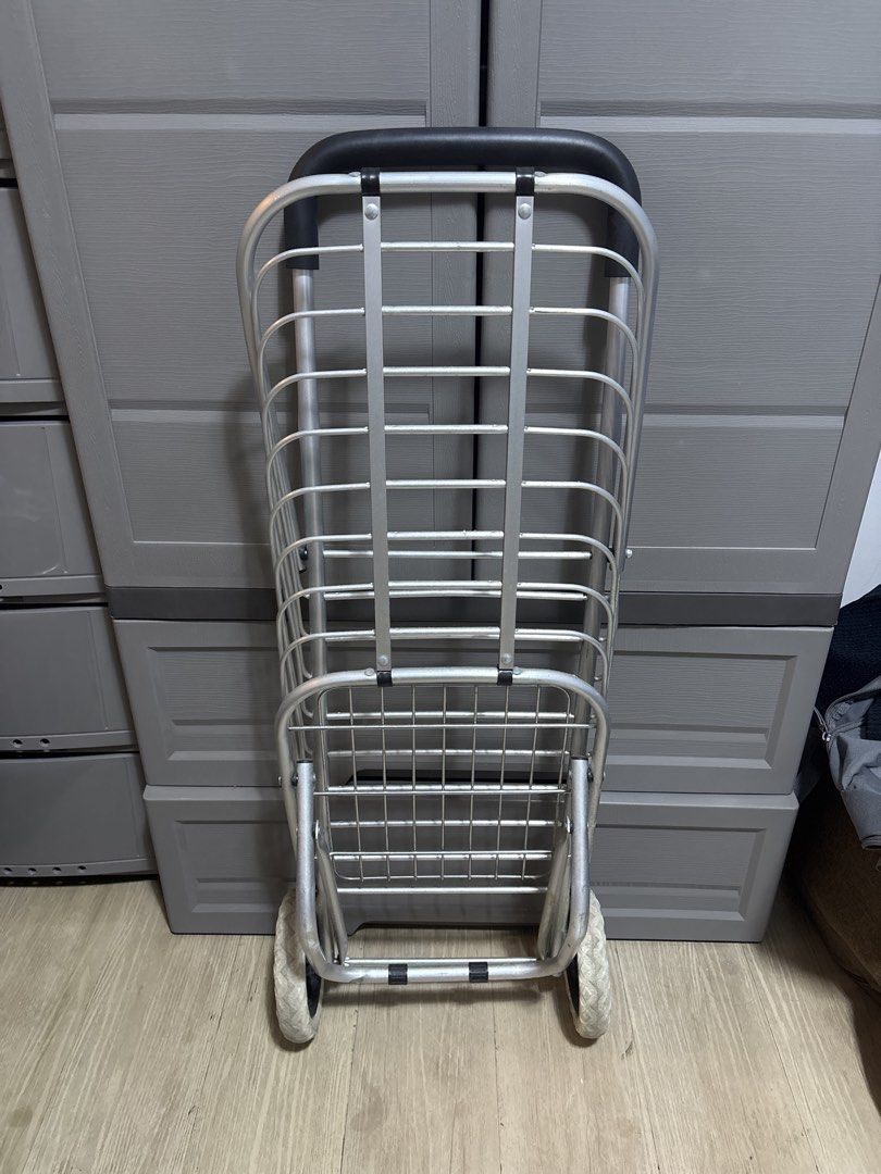 Silver Folding Shopping Trolley Cart with Handle (Category: Travel Essentials & Accessories) located in Quezon City. Submitted by ynnotot (Listing ID 1451780172, Image 2). Description: - Lightweight silver shopping trolley - Folds flat for easy storage - Sturdy frame with a comfortable handle - Easy transport with wheels - Ideal for market trips and errands - RFS: Not used anymore.
