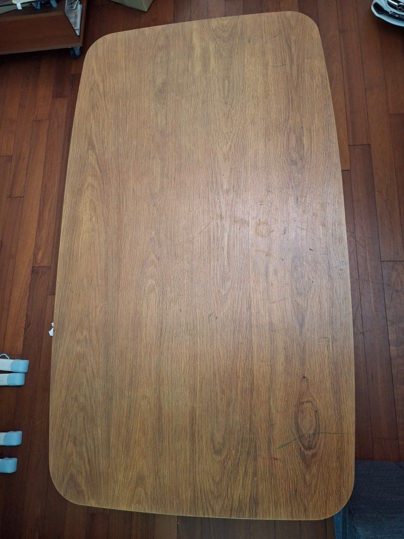 Solid wood rectangle table (Category: Tables & Sets) located in Singapore. Submitted by sizzlingak55228 (Listing ID 1451761439, Image 3). Description: - solid wood - can accommodate 4-6 Chairs - very stable - selling due to relocation .