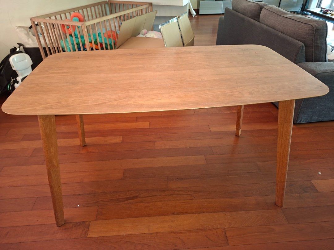 Solid wood rectangle table (Category: Tables & Sets) located in Singapore. Submitted by sizzlingak55228 (Listing ID 1451761439, Image 2). Description: - solid wood - can accommodate 4-6 Chairs - very stable - selling due to relocation .