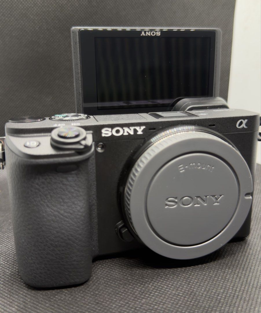 Sony Alpha a6400 bundle (Category: Cameras) located in Pasig City. Submitted by zerophoto48758 (Listing ID 1451878479, Image 1). Description: - Ideal for both photography and videography - Compact and lightweight design for portability - Ready for your next creative project Inclusions: - Sony A6400 body (No issues, almost new, low shutter count) - Sony A6000 body (some issues but is good as backup camera) - Sony 16-50mm kit lens - Meike Battery G