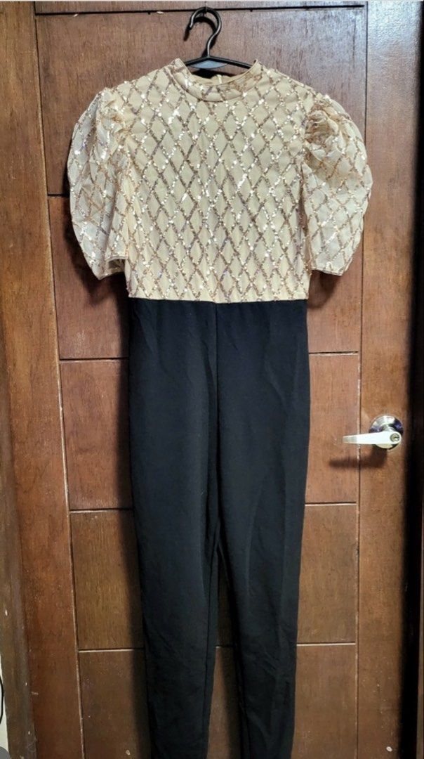 Sparkly Sequin Top Puff Sleeve Jumpsuit Black Pants (Category: Jumpsuits) located in Manila. Submitted by averythingg (Listing ID 1451855673, Image 2). Description: - Stunning gold sequin top with elegant puff sleeves - Ideal for Filipino themed events - Offers a chic and comfortable fit.
