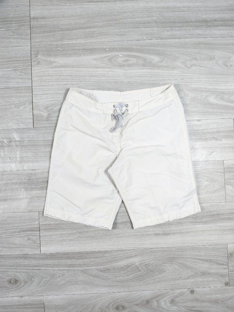 Stussy Board Shorts (Category: Shorts) located in Paranaque City. Submitted by pickersform (Listing ID 1451806963, Image 1). Description: - White Stussy board shorts size Small waistline 30-32 / Length 19 / opening 10 - Made from 100% nylon - Drawstring waist for adjustable fit - Back pocket with button closure - Quick-drying material - Ideal for beach, pool, or casual wear.
