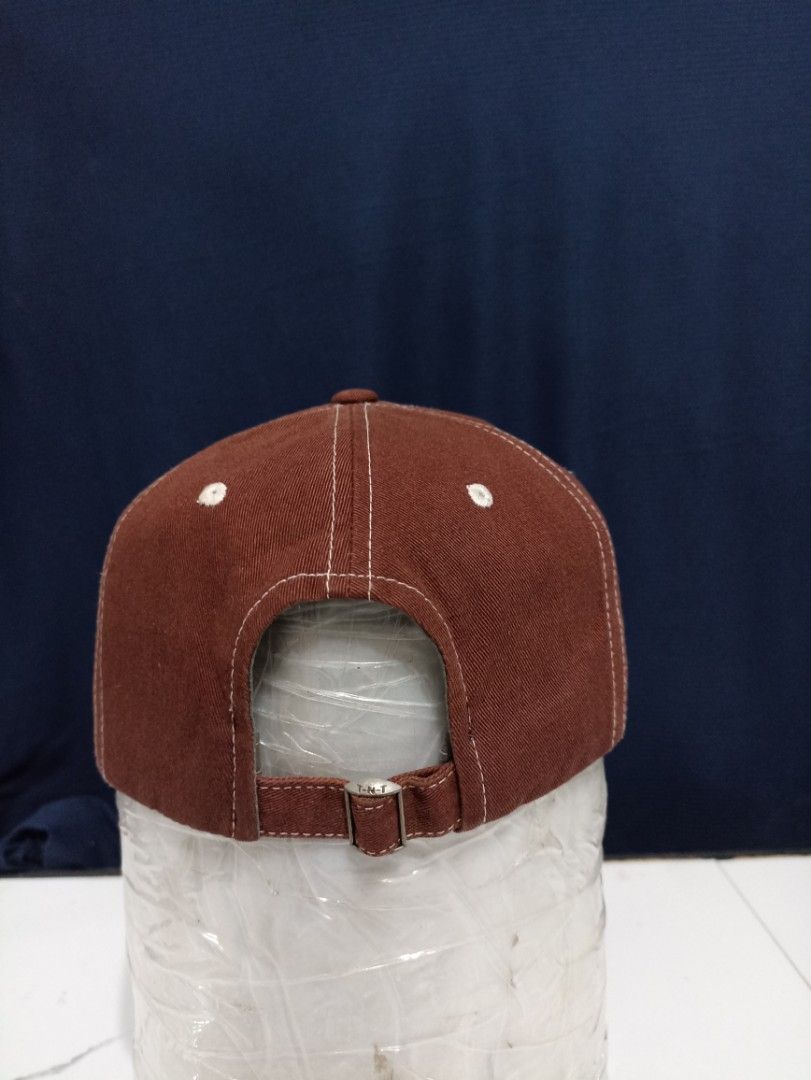 thisisneverthat Brown Embroidered Logo Baseball Cap (Category: Caps & Hats) located in Marawi City. Submitted by abdullah0692139 (Listing ID 1451860502, Image 3). Description: - Brand: thisisneverthat - Color: Brown - Design: Classic baseball cap - Feature: White embroidered logo on front - Fit: Adjustable strap at the back - Style: Versatile, great for everyday wear and matches most outfits.