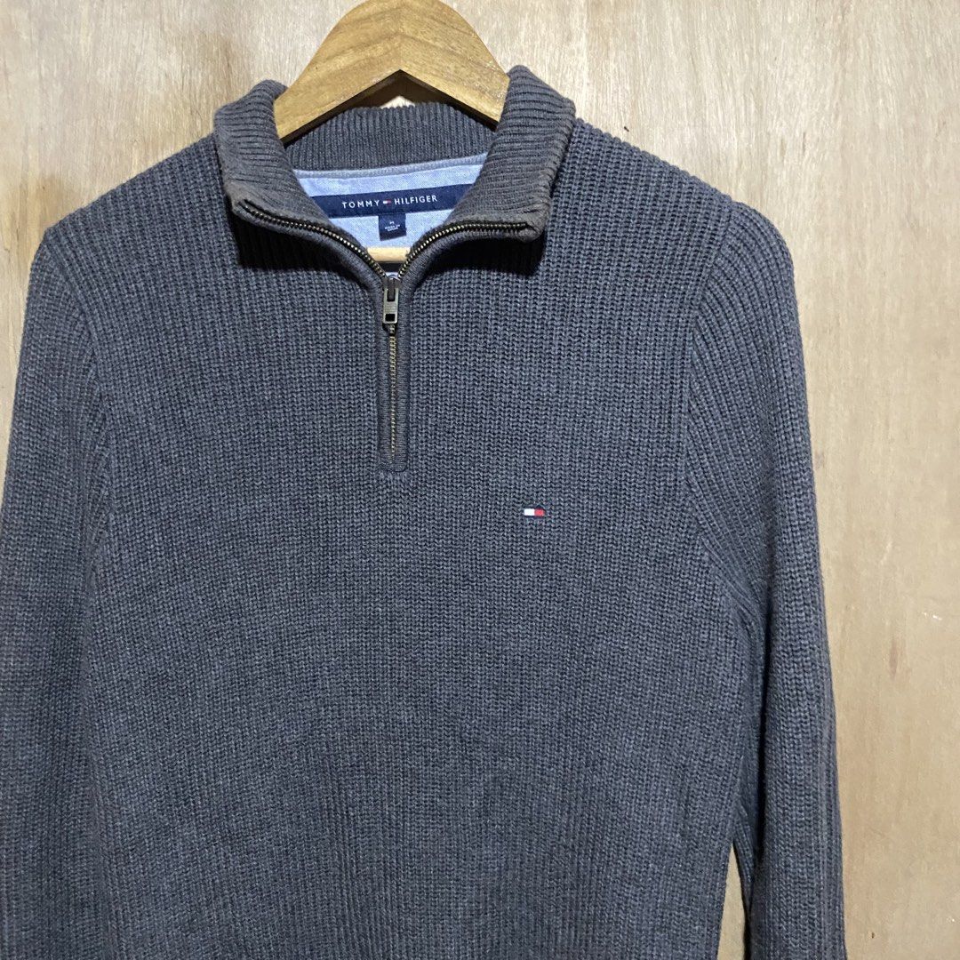 Tommy Hilfiger Grey Ribbed quarter-Zip Sweater Size M (Category: Coats, Jackets and Outerwear) located in Manila. Submitted by drp4drp (Listing ID 1451843677, Image 2). Description: Dimes: Length 29 Width 21 hem 17 Excellent condition Honest issue: minor discoloration sa neck but hindi naman halata swabeng swabe pwede picturan ulit para mas makita or kung need lang ng laba. - Grey Tommy Hilfiger sweater - Size: Medium (M) - Ribbed knit texture - 