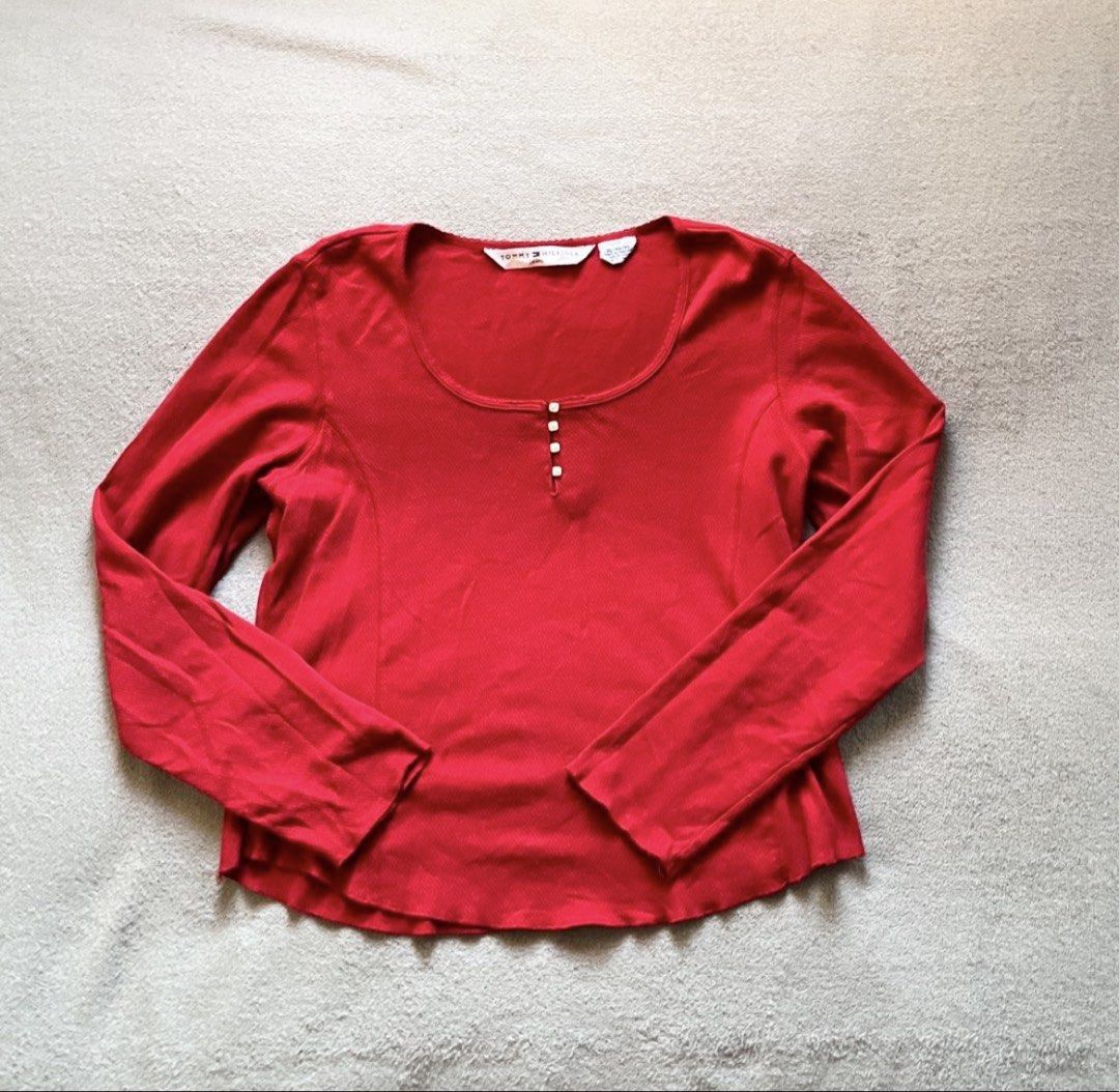 Tommy Hilfiger Red Blouse Top Long Sleeves (Category: Longsleeves) located in Naga. Submitted by kitty_cate02 (Listing ID 1451809709, Image 1). Description: Pre-owned Used twice In good condition - Brand: Tommy Hilfiger - Color: Red - Style: Long-sleeved top - Neckline: Scoop neck with 3-button henley placket - Texture: Subtle ribbed fabric - Hem: Slightly ruffled - Details: Tommy Hilfiger logo tag on sleeve cuff - Occasion: Casual wear Authentic