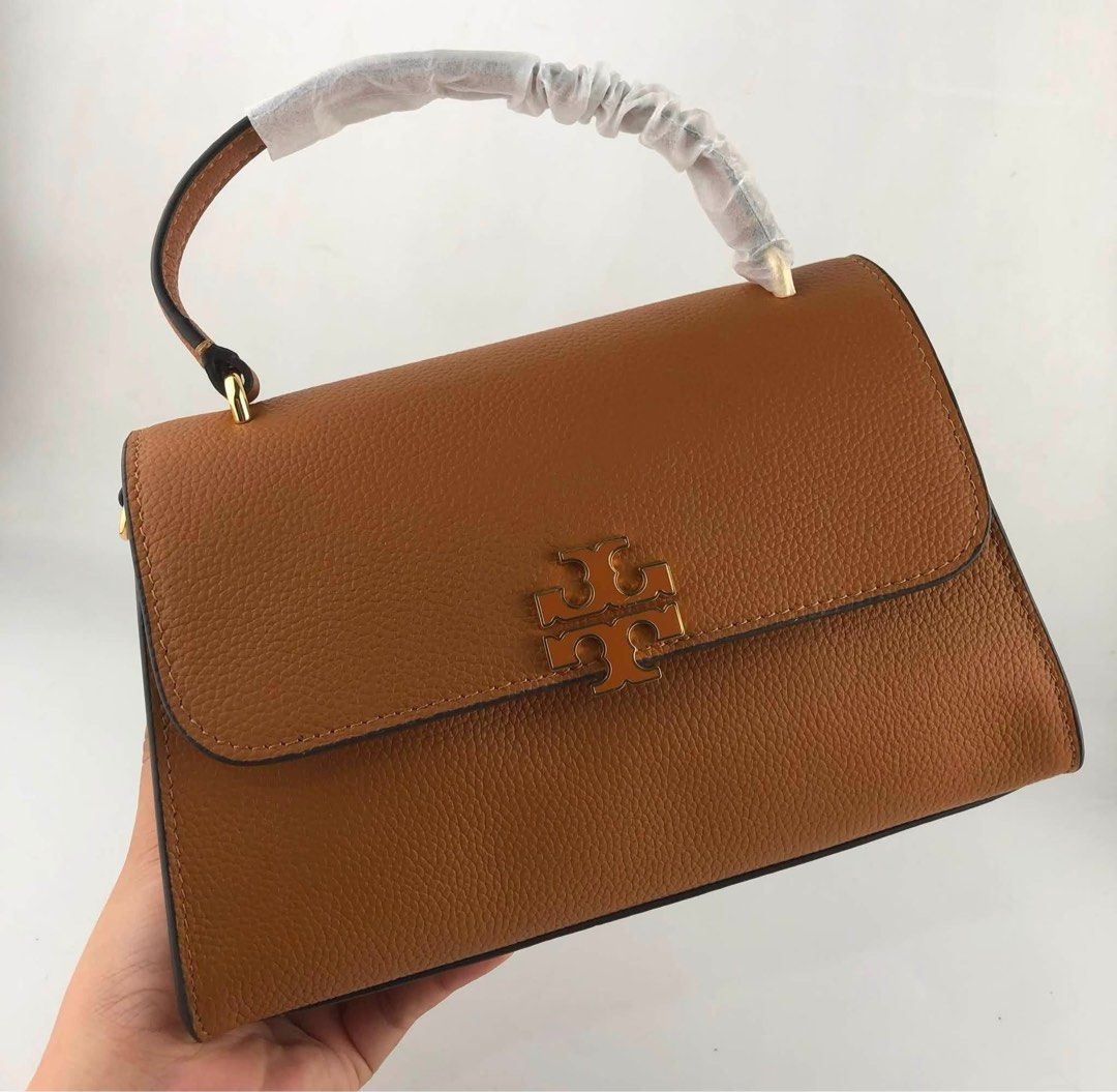 Tory Burch Britten Top Handle (Category: Cross-body Bags) located in Binan City. Submitted by pinkykeenshop (Listing ID 1451892553, Image 1). Description: .