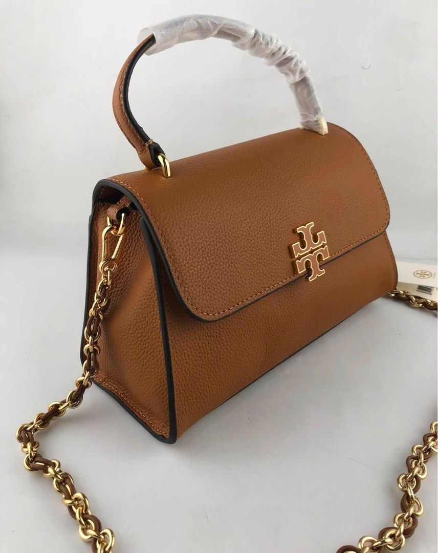 Tory Burch Britten Top Handle (Category: Cross-body Bags) located in Binan City. Submitted by pinkykeenshop (Listing ID 1451892553, Image 3). Description: .