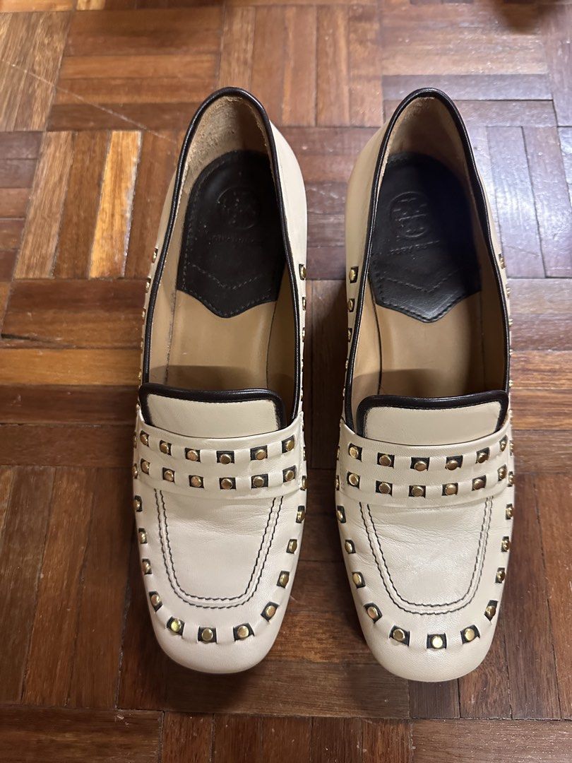 Tory Burch Cream Leather Studded Loafers (Category: Loafers) located in Paranaque City. Submitted by declutter_therapy (Listing ID 1451841098, Image 2). Description: - Brand: Tory Burch - Color: Cream - Material: Leather - Style: Loafers - Size: 8 - Details: Gold-tone stud embellishments around the edges - Insole: Features Tory Burch logo - Origin: Made in Italy.