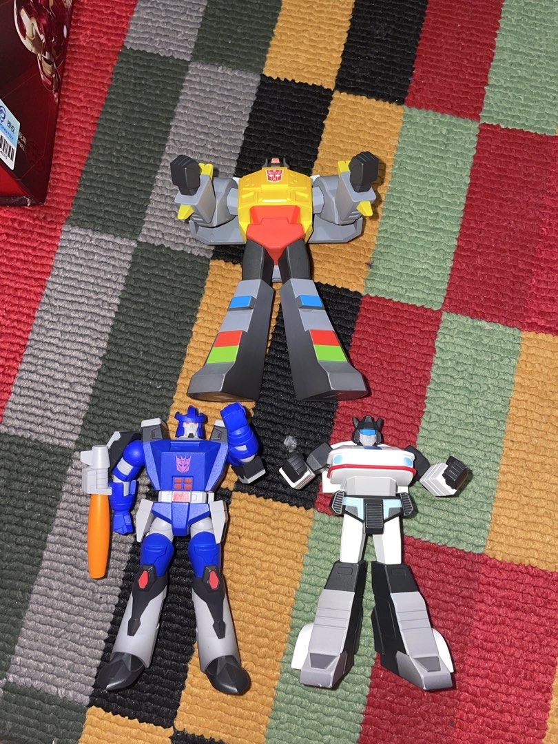 Transformers Animated Figures (Category: Toy Figures) located in Singapore. Submitted by mohamadaq88129 (Listing ID 1451867430, Image 1). Description: - Set of 3 Transformers Animated figures - Includes Grimlock, Galvatron, and Jazz - Great for collectors and fans of the show - able to nego -no box -.