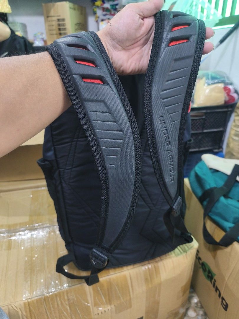 Under Armour Undeniable 3.0 (Category: Backpacks) located in Manila. Submitted by fel0230 (Listing ID 1451742692, Image 2). Description: This is an Under Armour Undeniable 3.0 backpack, featuring a vibrant red logo and a prominent red strap detail on a dark blue and black body..