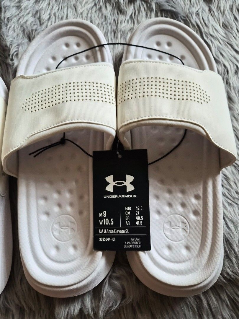 Under Armour White Slides Sandals (Category: Slippers & Slides) located in Manila. Submitted by jayy2021 (Listing ID 1451714117, Image 3). Description: Brand new old stock under armour slides. size 9 and 8 US php 600 for both..