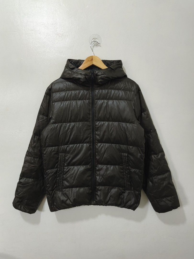 Uniqlo Brown Down Puffer Jacket Men Medium (Category: Coats, Jackets and Outerwear) located in Balanga. Submitted by winterlab_ph (Listing ID 1451702809, Image 2). Description: Code: A404 Width: 21.5 Length: 26.5 Shoulders: 18 Sleeves: 24.5.