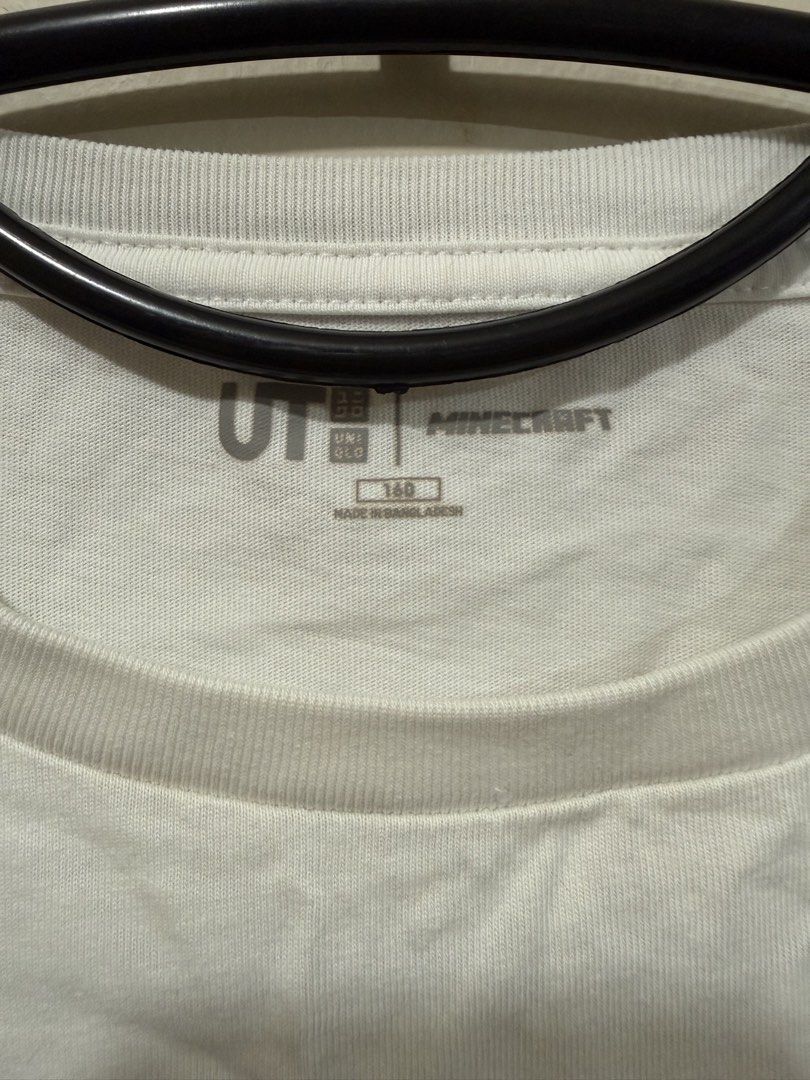 UNIQLO Minecraft Shirt (Category: Babies & Kids Fashion) located in Taguig. Submitted by _decluttermomma_ (Listing ID 1451880632, Image 2). Description: Preloved UNIQLO Shirt Size 160 (8-10 years old) Like new 💵 200.