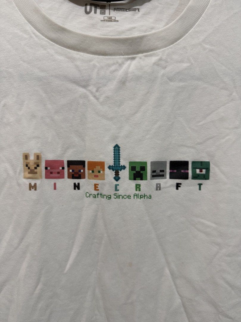 UNIQLO Minecraft Shirt (Category: Babies & Kids Fashion) located in Taguig. Submitted by _decluttermomma_ (Listing ID 1451880632, Image 3). Description: Preloved UNIQLO Shirt Size 160 (8-10 years old) Like new 💵 200.