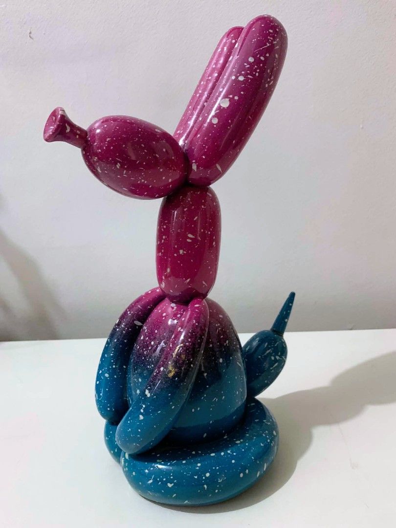 Unique Balloon Dog Decor Sculpture - Galaxy Design (Category: Other Home Decor) located in Quezon City. Submitted by dfabloveverything (Listing ID 1451874529, Image 1). Description: - Unique balloon dog sculpture with a stunning galaxy design. - Features a beautiful gradient from deep blue to vibrant magenta. - Speckled with white and gold paint for an artistic touch. - Adds a pop of color and fun to any room. - Ideal for displaying on shelves, d