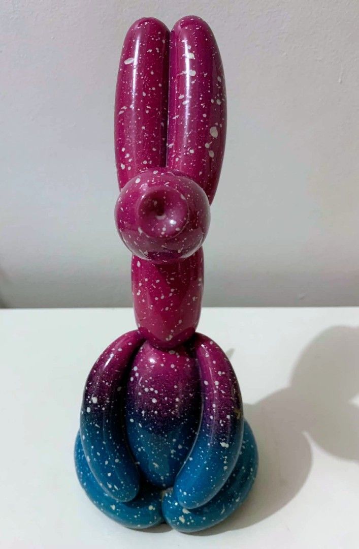 Unique Balloon Dog Decor Sculpture - Galaxy Design (Category: Other Home Decor) located in Quezon City. Submitted by dfabloveverything (Listing ID 1451874529, Image 2). Description: - Unique balloon dog sculpture with a stunning galaxy design. - Features a beautiful gradient from deep blue to vibrant magenta. - Speckled with white and gold paint for an artistic touch. - Adds a pop of color and fun to any room. - Ideal for displaying on shelves, d