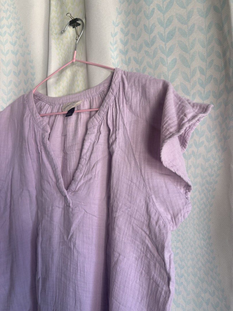 Universal Thread Purple 100% Cotton Gauze Top (Category: Blouses) located in Adams. Submitted by eggs.sam.cheese (Listing ID 1451806427, Image 3). Description: - Lightweight gauze top from Universal Thread - Pretty lilac purple color - V-neck with gathered detail - Short, fluttery sleeves - Made of 100% cotton - Ideal for casual wear or layering - Easy to style.