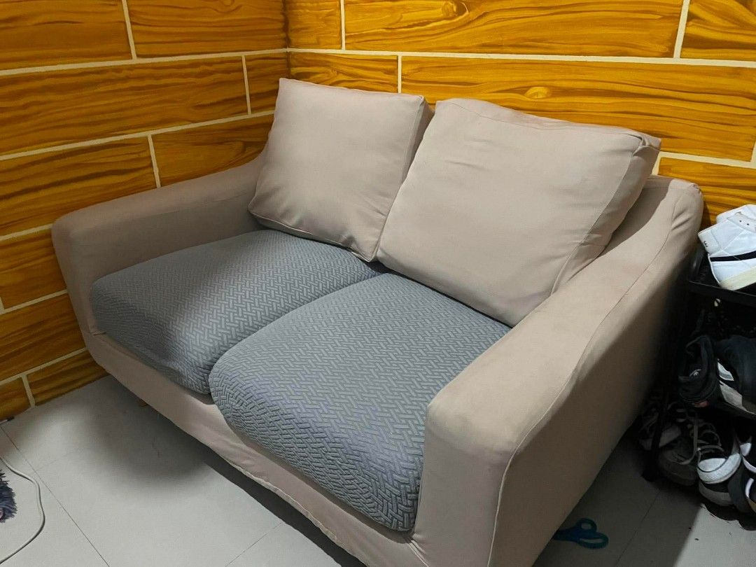 Uratex 2-Seater Sofa with Cushions (Category: Sofas) located in Quezon City. Submitted by hlaeiy (Listing ID 1451774438, Image 2). Description: Uratex 2-Seater Sofa Super comfy halos bago pa, walang lundo. No issues, what you see is what you get. RFS: Moving out. Negotiable price, libre tawad 😊 Buyer will shoulder sf. Location: Valenzuela City..